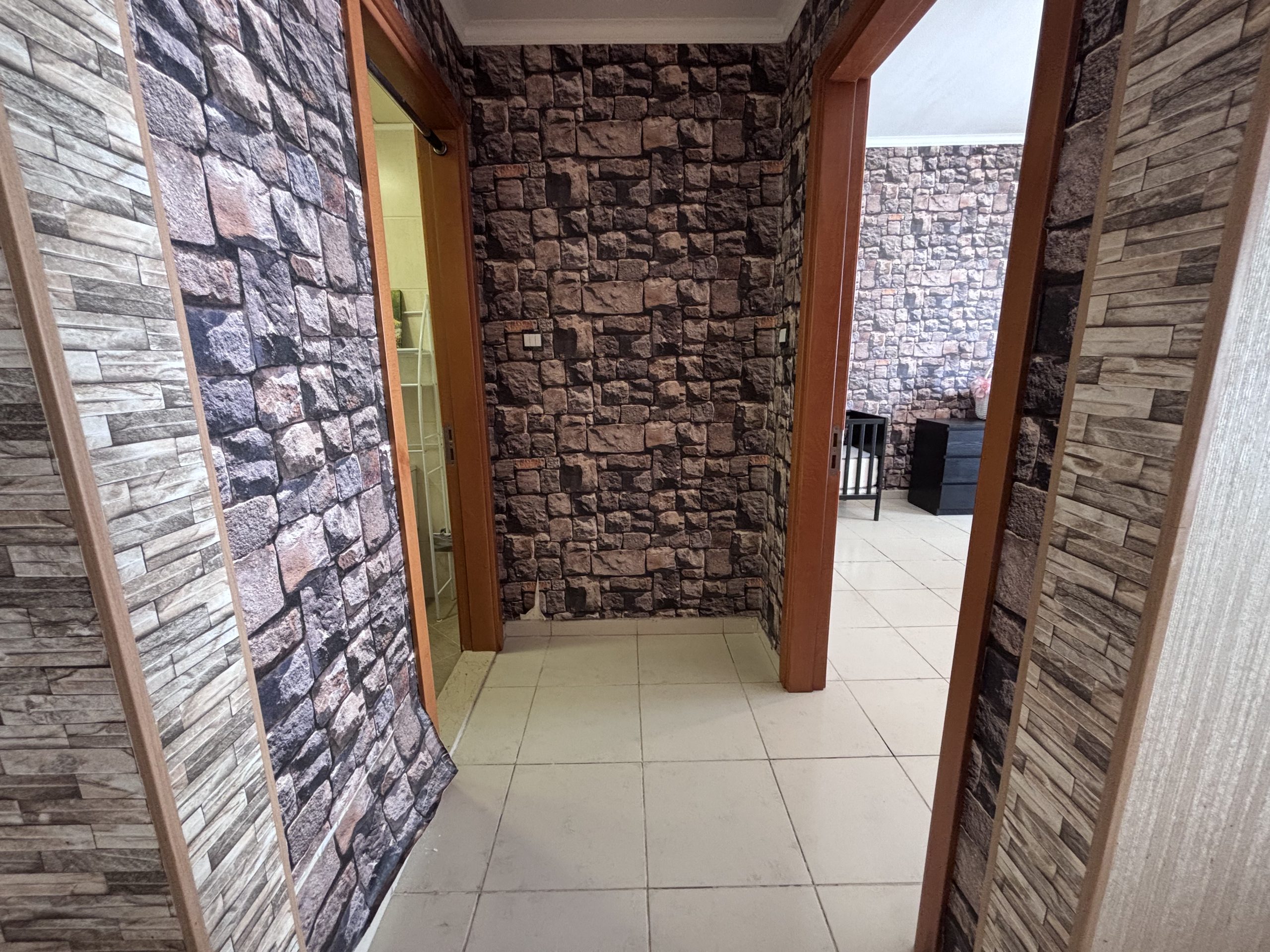 well-lit living and dining area. A guest bathroom adds convenience