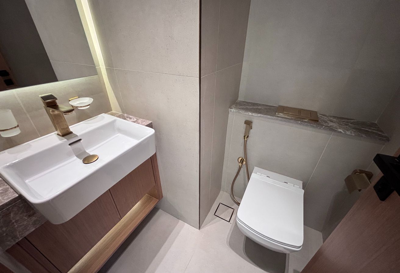 and washing machine. The living area opens to a private balcony