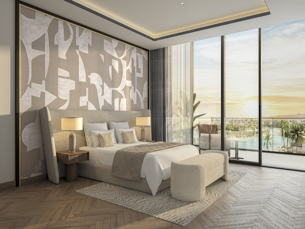featuring a smart and functional layout ideal for modern living. The unit includes a private balcony with open lagoon views