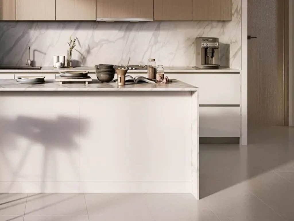 The thoughtfully designed layout includes an open kitchen with a breakfast bar