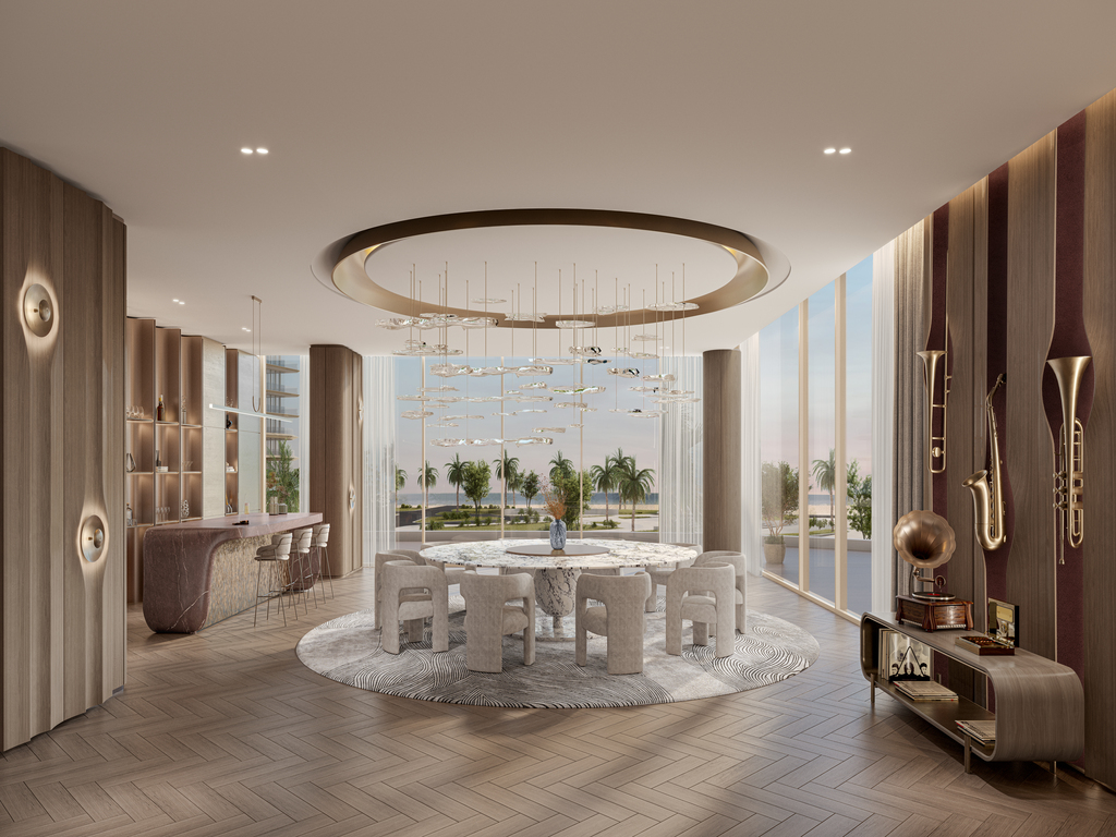 living and dining area opening onto the balcony with back sea views. The bedroom also has balcony access